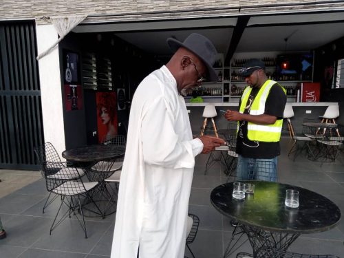 J-Wanz and Mr Adjololo on set rehearsing the script